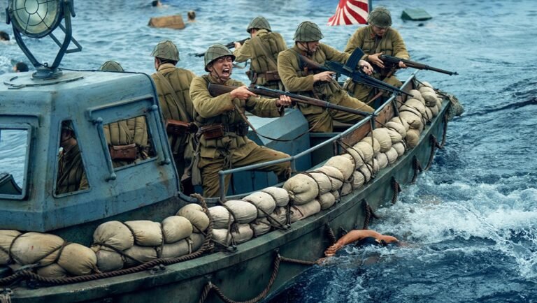 World War II soldiers in a boat, armed with rifles, in the ocean. Japanese flag visible.