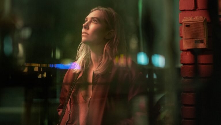 Allyson Riggs portrait. Actress with blonde hair looking up. Netflix film still.