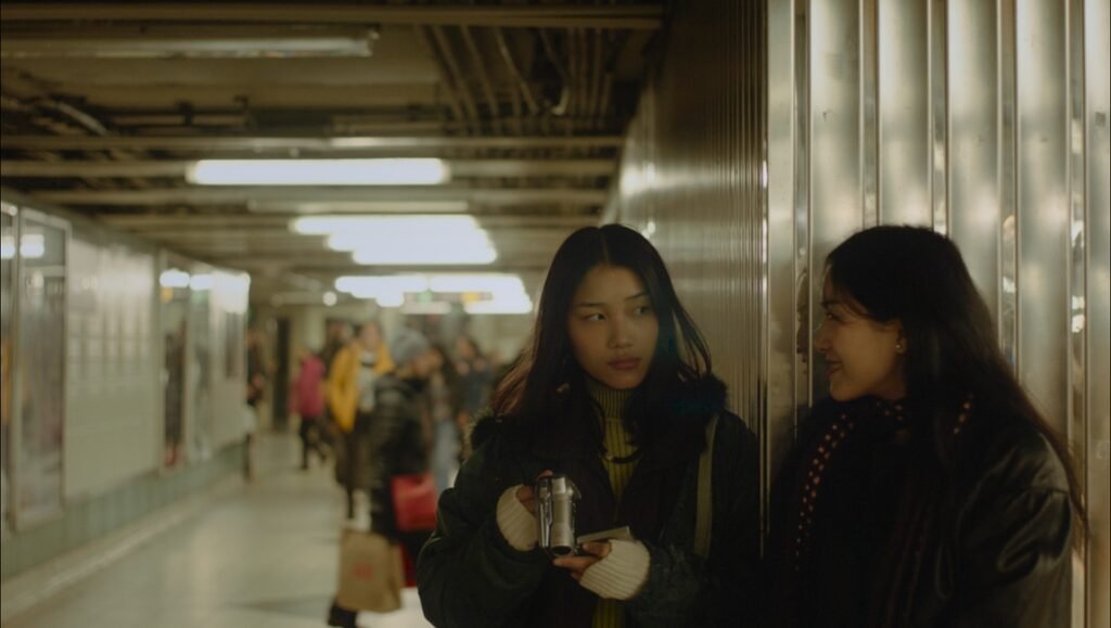 100 Sunset still: Two women in an underground tunnel. TIFF '25 review.