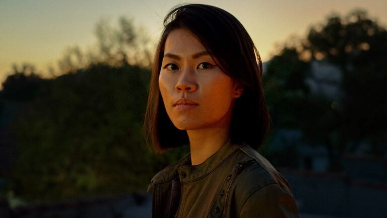 Portrait of Siyou Isabelle Tan, actress and filmmaker, against a sunset backdrop. Danielle Krudy photography.
