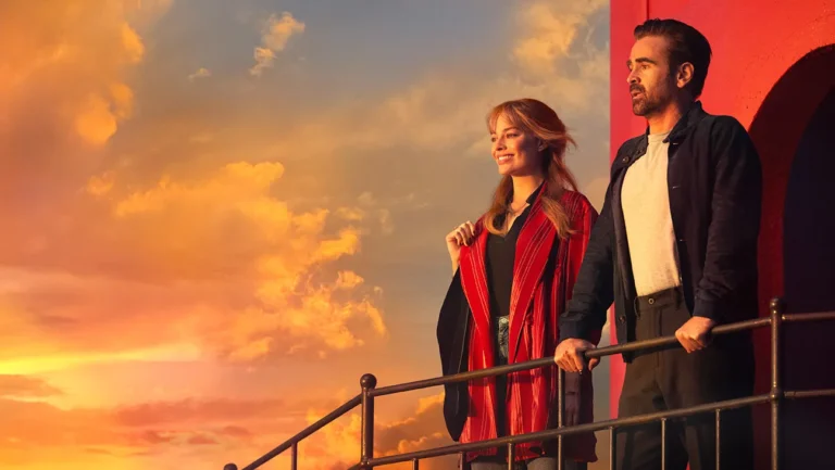 Emma Stone and Colin Farrell in A Big Bold Beautiful Journey, a Kogonada film, stand against a sunset sky.