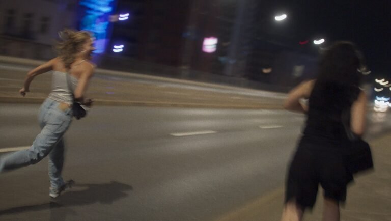 Two women running at night. 100 Sunset TIFF '25 film review.