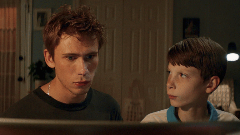 The Ugly movie review: Two male actors in a scene, one older, one younger.
