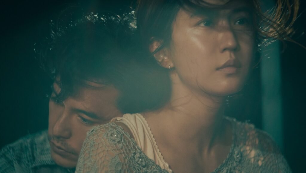 Couple portrait. Young woman with man leaning on her shoulder. Intimate, romantic moment. Film still.