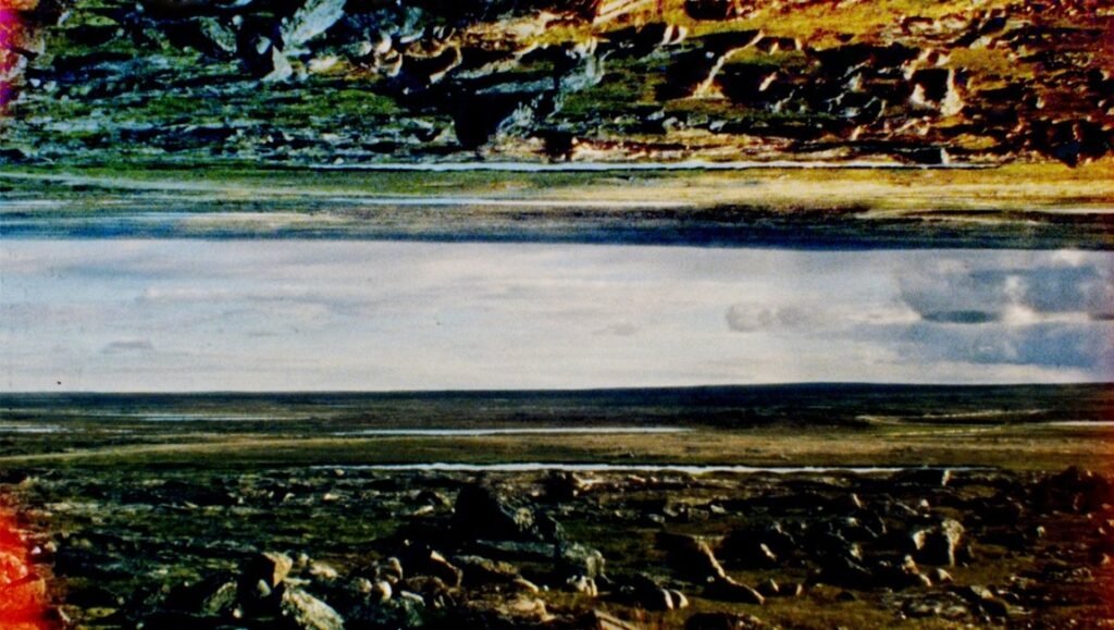 Abstract landscape art of Tuktuit Nogait National Park. Rocky terrain, sky, and horizon line.