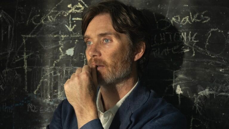 Cillian Murphy in The Ugly movie review. Actor with beard against chalkboard. Yeon Sang-ho film.