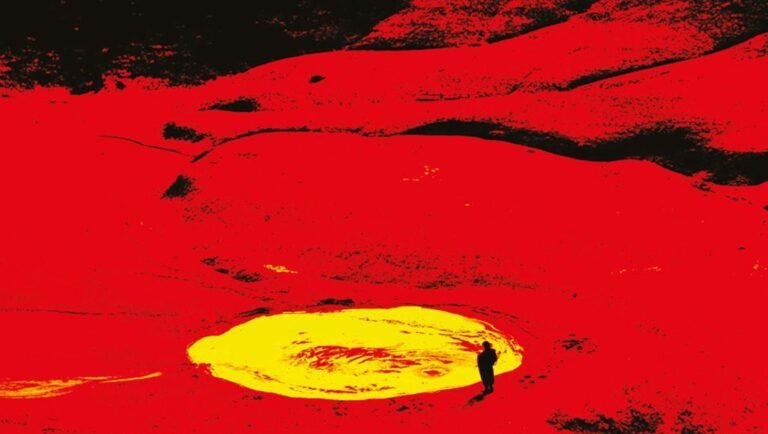 Laguna film still: Person stands near a yellow pool in a red landscape. Šarūnas Bartas movie review.