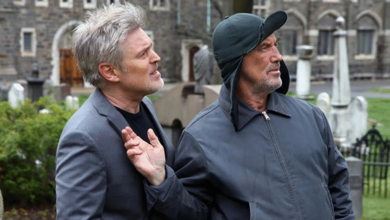 The Ugly movie review: Two men in a graveyard, one in a suit, the other in a cap, both looking up.