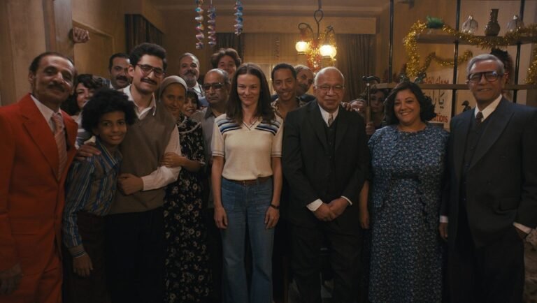 Film still from "The Stories" at Tallinn Black Nights Film Festival, featuring a group of diverse people posing together.