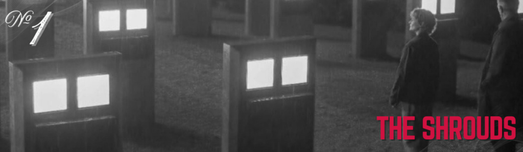 Movie poster for The Shrouds, featuring illuminated memorials and two figures in a dark, somber scene. Thriller movie.