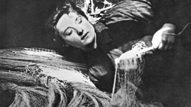The Sea Edits: Jean Epstein at Viennale 63 Jean Epstein film still, a woman with eyes closed mending a fishing net, Viennale 63, The Sea Edits vintage cinema.