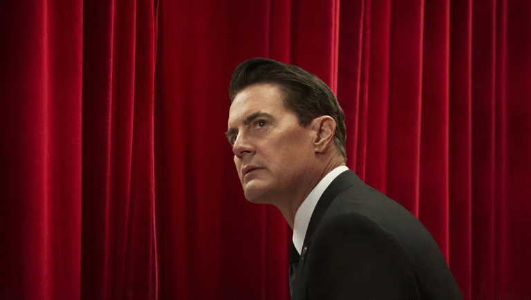 Twin Peaks: The Return, Kyle MacLachlan as Dale Cooper against red curtains, episodes 1-2 promo image.