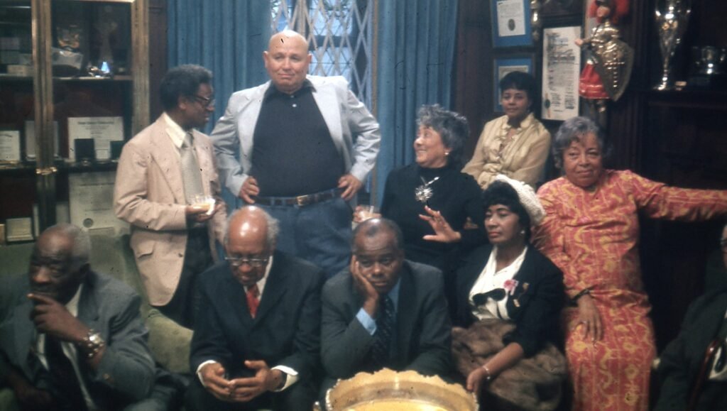 Still from "Once Upon a Time in Harlem": Group portrait of William Greaves and others, celebrating Harlem's rich history.