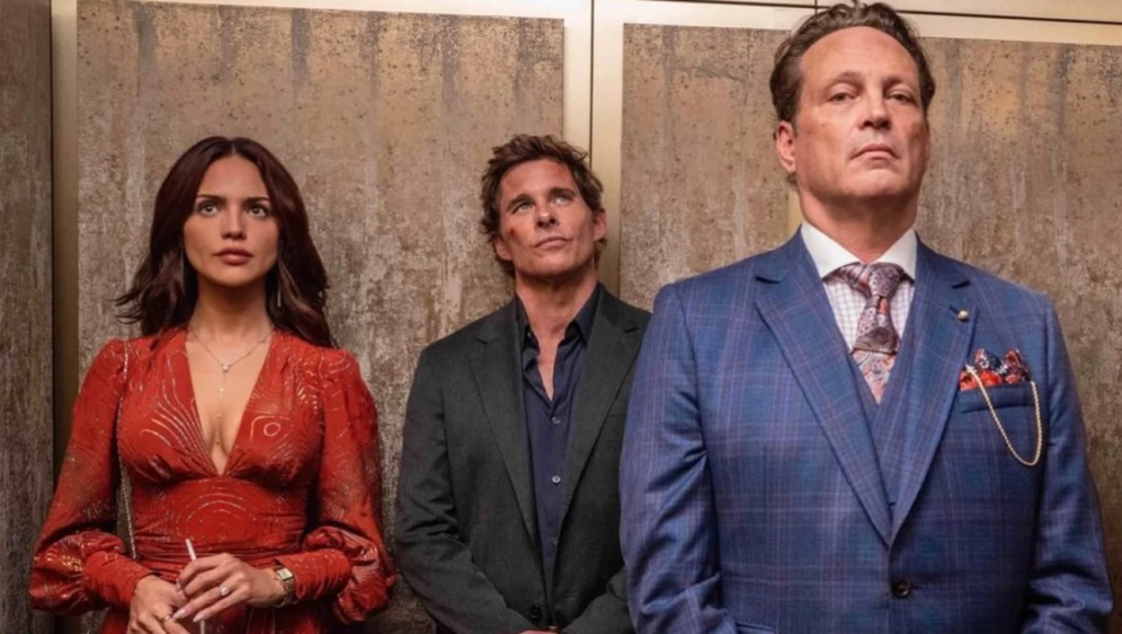 Mike & Nick & Nick & Alice movie review. Three characters in an elevator: a woman in red, a man hurt, and a man in a suit.