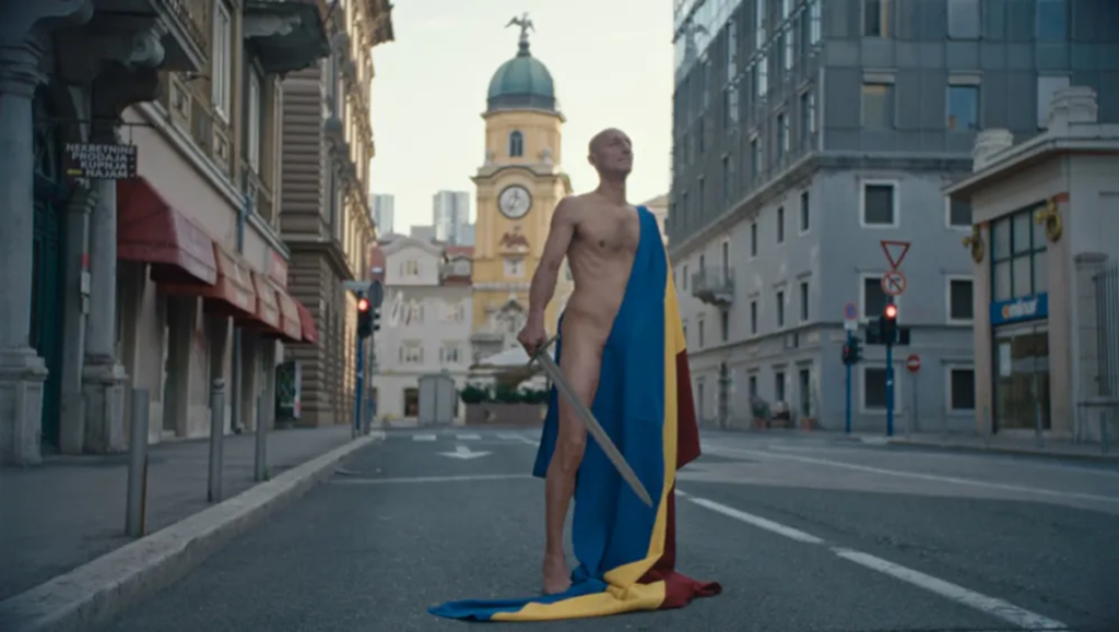 Fiume O Morte: Nude man with sword and flag stands on street in Fiume, Italy, near clock tower. Essay illustration.