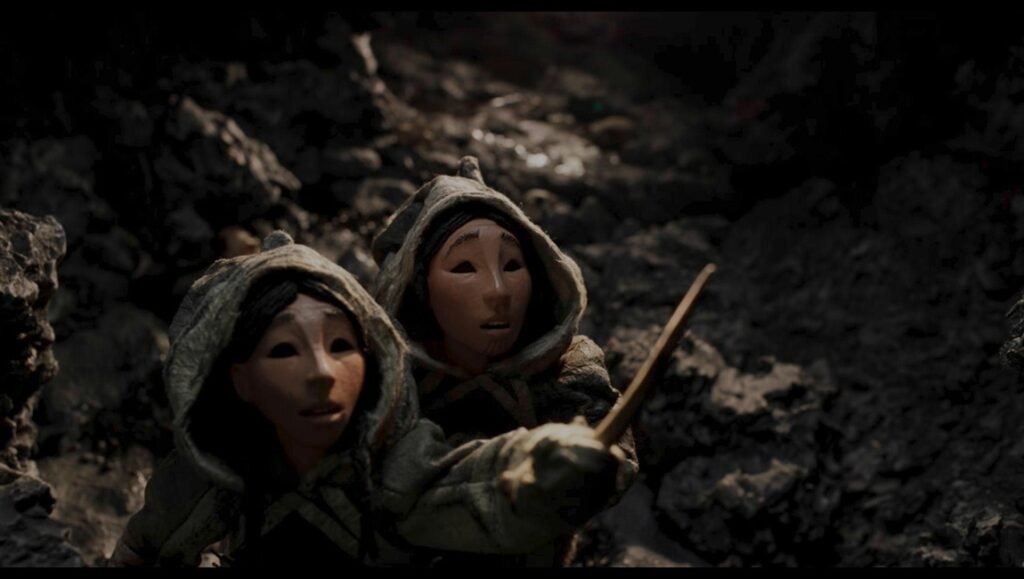 LAFM 2026 Shorts Program still: Two figures in hooded garments from "The Gnawer of Rocks (Mangittatuarjuk)" stop-motion animation.