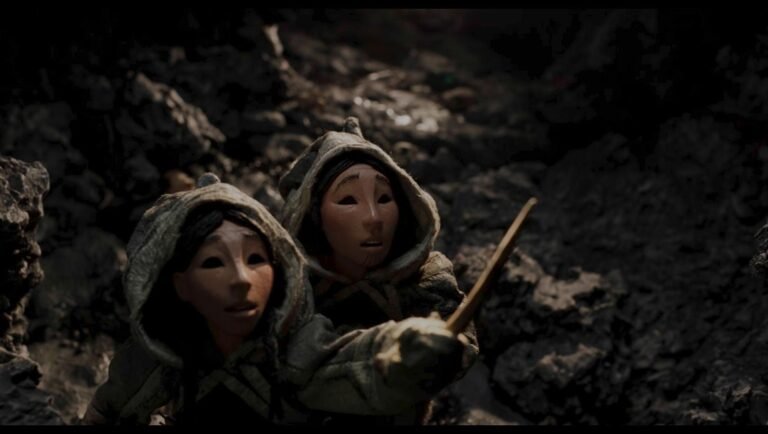 LAFM 2026 Shorts Program still: Two figures in hooded garments from "The Gnawer of Rocks (Mangittatuarjuk)" stop-motion animation.