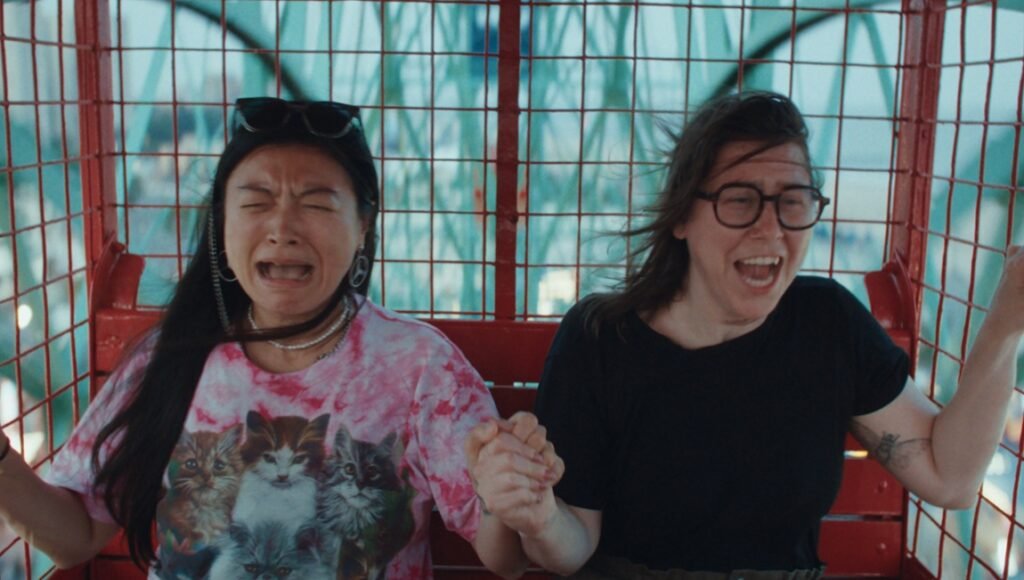 Leviticus film review: Two women on a Ferris wheel, one screaming in fear, the other in joy during the Daniel Chein Corso film.