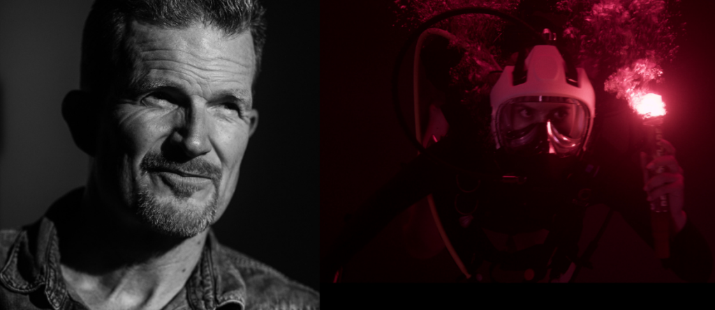 Jesse V. Johnson in a black and white portrait next to a diver holding a glowing red flare in dark water.
