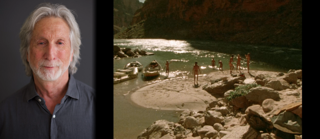 Robb Moss beside a scene of people standing on a sandy riverbank with boats near rocky canyon walls.