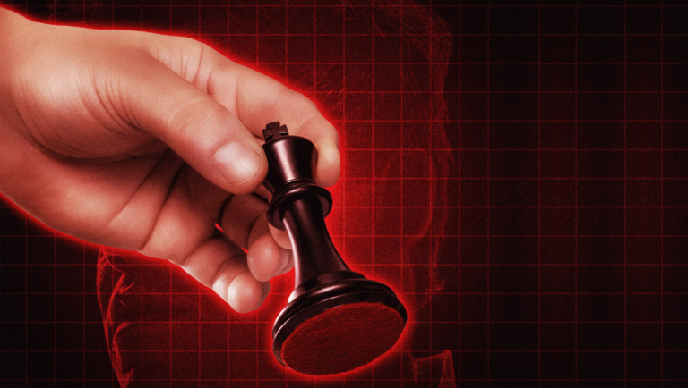 A hand holds a black chess king piece against a red glowing grid background.